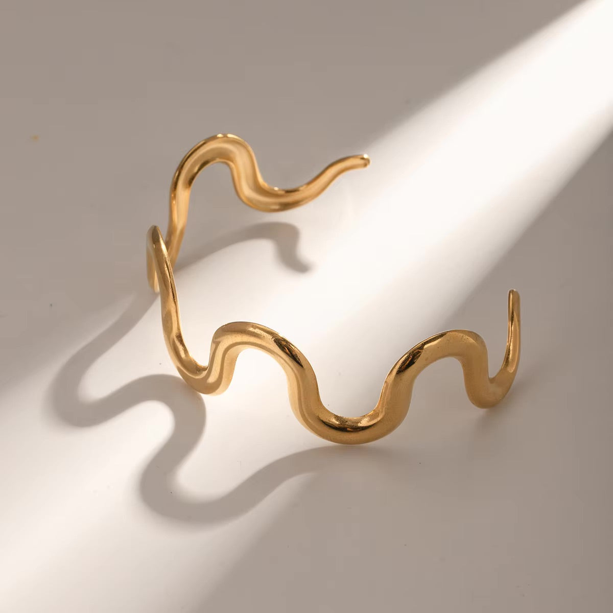 Senna Twisted Gold Bangle